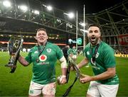 18 March 2023; Tadhg Furlong of Ireland, left, and Conor Murray celebrate with the Six Nations trophy and Triple Crown trophy after the Guinness Six Nations Rugby Championship match between Ireland and England at Aviva Stadium in Dublin. Photo by Harry Murphy/Sportsfile