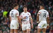 18 March 2023; England players, from left,  Henry Slade, Henry Arundell and Anthony Watson during the Guinness Six Nations Rugby Championship match between Ireland and England at the Aviva Stadium in Dublin. Photo by Seb Daly/Sportsfile