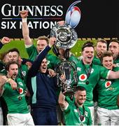 18 March 2023; Ireland captain Jonathan Sexton lifts the Six Nations trophy, as Garry Ringrose and James Ryan lift the Triple Crown trophy after the Guinness Six Nations Rugby Championship match between Ireland and England at Aviva Stadium in Dublin. Photo by Ramsey Cardy/Sportsfile