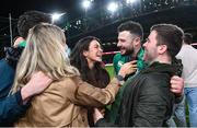 18 March 2023; Robbie Henshaw of Ireland celebrates with family after the Guinness Six Nations Rugby Championship match between Ireland and England at Aviva Stadium in Dublin. Photo by Ramsey Cardy/Sportsfile