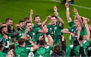 18 March 2023; Ireland players celebrate after the Guinness Six Nations Rugby Championship match between Ireland and England at Aviva Stadium in Dublin. Photo by Ramsey Cardy/Sportsfile