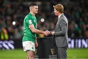 18 March 2023; Ireland captain Jonathan Sexton shakes hands with Diageo president John Kennedy after the Guinness Six Nations Rugby Championship match between Ireland and England at Aviva Stadium in Dublin. Photo by Harry Murphy/Sportsfile