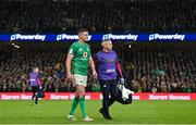 18 March 2023; Jonathan Sexton of Ireland leaves the pitch with an injury during the Guinness Six Nations Rugby Championship match between Ireland and England at Aviva Stadium in Dublin. Photo by Ramsey Cardy/Sportsfile