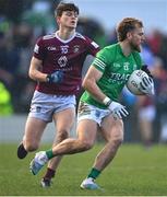 18 March 2023; Ultan Kelm of Fermanagh in action against Senan Baker of Westmeath during the Allianz Football League Division 3 match between Fermanagh and Westmeath at St Josephs Park in Ederney, Fermanagh. Photo by Stephen Marken/Sportsfile