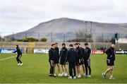 19 March 2023; Clare players inspect the pitch before the Allianz Football League Division 2 match between Derry and Clare at Derry GAA Centre of Excellence in Owenbeg, Derry. Photo by Ben McShane/Sportsfile