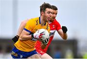 19 March 2023; Manus Doherty of Clare in action against Naill Loughlin of Derry during the Allianz Football League Division 2 match between Derry and Clare at Derry GAA Centre of Excellence in Owenbeg, Derry. Photo by Ben McShane/Sportsfile