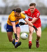 19 March 2023; Ronan Lanigan of Clare in action against Ethan Doherty of Derry during the Allianz Football League Division 2 match between Derry and Clare at Derry GAA Centre of Excellence in Owenbeg, Derry. Photo by Ben McShane/Sportsfile