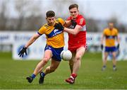19 March 2023; Ronan Lanigan of Clare in action against Ethan Doherty of Derry during the Allianz Football League Division 2 match between Derry and Clare at Derry GAA Centre of Excellence in Owenbeg, Derry. Photo by Ben McShane/Sportsfile