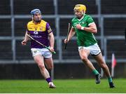 19 March 2023; Cathal O'Neil of Limerick in action against Kevin Foley of Wexford during the Allianz Hurling League Division 1 Group A match between Limerick and Wexford at TUS Gaelic Grounds in Limerick. Photo by Tyler Miller/Sportsfile