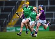 19 March 2023; Cathal O'Neil of Limerick in action against Kevin Foley of Wexford during the Allianz Hurling League Division 1 Group A match between Limerick and Wexford at TUS Gaelic Grounds in Limerick. Photo by Tyler Miller/Sportsfile