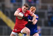 19 March 2023; Conn Kilpatrick of Tyrone in action against Ryan O’Toole of Monaghan during the Allianz Football League Division 1 match between Monaghan and Tyrone at St Tiernach's Park in Clones, Monaghan. Photo by Daire Brennan/Sportsfile