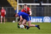 19 March 2023; Thomas McPhilips of Monaghan in action against Cormac Quinn of Tyrone during the Allianz Football League Division 1 match between Monaghan and Tyrone at St Tiernach's Park in Clones, Monaghan. Photo by Daire Brennan/Sportsfile