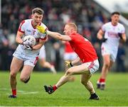 19 March 2023; Luke Fahy of Cork in action against Donal McKenny of Louth during the Allianz Football League Division 2 match between Louth and Cork at Páirc Mhuire in Ardee, Louth. Photo by Stephen Marken/Sportsfile