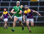 19 March 2023; Kyle Hayes of Limerick in action against Rory Higgins of Wexford during the Allianz Hurling League Division 1 Group A match between Limerick and Wexford at TUS Gaelic Grounds in Limerick. Photo by Tyler Miller/Sportsfile