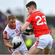 19 March 2023; Killian O’Hanlon of Cork in action against Conal McCaul of Louth during the Allianz Football League Division 2 match between Louth and Cork at Páirc Mhuire in Ardee, Louth. Photo by Stephen Marken/Sportsfile