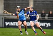 19 March 2023; Cian Boland of Dublin in action against Donnchadh Hartnett of Laois during the Allianz Hurling League Division 1 Group B match between Dublin and Laois at Parnell Park in Dublin. Photo by Sam Barnes/Sportsfile