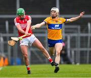 19 March 2023; Brian Roche of Cork is tackled by Ryan Taylor of Clare during the Allianz Hurling League Division 1 Group A match between Clare and Cork at Cusack Park in Ennis, Clare. Photo by Ray McManus/Sportsfile