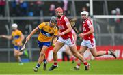 19 March 2023; David Reidy of Clare in action against Brian Hayes of Cork during the Allianz Hurling League Division 1 Group A match between Clare and Cork at Cusack Park in Ennis, Clare. Photo by Ray McManus/Sportsfile