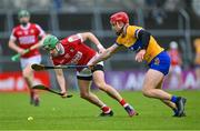 19 March 2023; Alan Cadogan of Cork is tackled by John Conlon of Clare during the Allianz Hurling League Division 1 Group A match between Clare and Cork at Cusack Park in Ennis, Clare. Photo by Ray McManus/Sportsfile