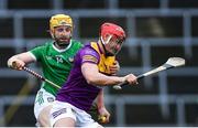 19 March 2023; Lee Chin of Wexford in action against Seamus Flanagan of Limerick during the Allianz Hurling League Division 1 Group A match between Limerick and Wexford at TUS Gaelic Grounds in Limerick. Photo by Tyler Miller/Sportsfile