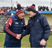 19 March 2023; Cork manager John Cleary shakes hands with Louth manager Mickey Harte after the Allianz Football League Division 2 match between Louth and Cork at Páirc Mhuire in Ardee, Louth. Photo by Stephen Marken/Sportsfile
