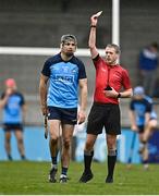 19 March 2023; Referee Shane Hynes shows Danny Sutcliffe of Dublin a yellow card during the Allianz Hurling League Division 1 Group B match between Dublin and Laois at Parnell Park in Dublin. Photo by Sam Barnes/Sportsfile