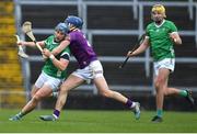 19 March 2023; Mike Casey of Limerick is tackled by Shane Reck of Wexford during the Allianz Hurling League Division 1 Group A match between Limerick and Wexford at TUS Gaelic Grounds in Limerick. Photo by Tyler Miller/Sportsfile