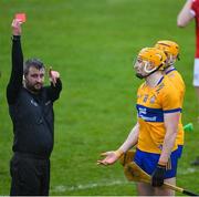 19 March 2023; Referee Thomas Walsh shows a red card to David Fitzgerald of Clare during the Allianz Hurling League Division 1 Group A match between Clare and Cork at Cusack Park in Ennis, Clare. Photo by Ray McManus/Sportsfile