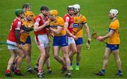 19 March 2023; Players from both sides jostle before David Fitzgerald of Clare, was shown a red card, during the Allianz Hurling League Division 1 Group A match between Clare and Cork at Cusack Park in Ennis, Clare. Photo by Ray McManus/Sportsfile