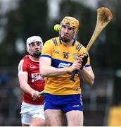 19 March 2023; David Fitzgerald of Clare in action against Eoin Roche of Cork during the Allianz Hurling League Division 1 Group A match between Clare and Cork at Cusack Park in Ennis, Clare. Photo by John Sheridan/Sportsfile