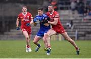 19 March 2023; Darren Hughes of Monaghan in action against Brian Kennedy of Tyrone during the Allianz Football League Division 1 match between Monaghan and Tyrone at St Tiernach's Park in Clones, Monaghan. Photo by Daire Brennan/Sportsfile