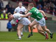 19 March 2023; Kevin O'Callaghan of Kildare in action against Killian Ryan of Limerick during the Allianz Football League Division 2 match between Limerick and Kildare at TUS Gaelic Grounds in Limerick. Photo by Tyler Miller/Sportsfile