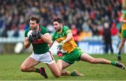 19 March 2023; Aidan O'Shea of Mayo in action against Stephen McMenamin of Donegal during the Allianz Football League Division 1 match between Donegal and Mayo at MacCumhaill Park in Ballybofey, Donegal. Photo by Ramsey Cardy/Sportsfile