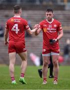 19 March 2023; Cormac Quinn, left, and Liam Rafferty of Tyrone celebrate after the Allianz Football League Division 1 match between Monaghan and Tyrone at St Tiernach's Park in Clones, Monaghan. Photo by Daire Brennan/Sportsfile