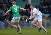 19 March 2023; Darragh Kirwan of Kildare in action against Sean O'Dea of Limerick during the Allianz Football League Division 2 match between Limerick and Kildare at TUS Gaelic Grounds in Limerick. Photo by Tyler Miller/Sportsfile