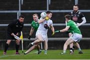 19 March 2023; Alex Beirne of Kildare is tackled by Adrian Enright of Limerick during the Allianz Football League Division 2 match between Limerick and Kildare at TUS Gaelic Grounds in Limerick. Photo by Tyler Miller/Sportsfile