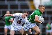 19 March 2023; Gordon Brown of Limerick in action against Barry Coffey of Kildare during the Allianz Football League Division 2 match between Limerick and Kildare at TUS Gaelic Grounds in Limerick. Photo by Tyler Miller/Sportsfile