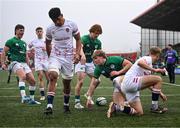 19 March 2023; Hugh Gavin of Ireland, centre, with Henry McErlean and John Devine, left, after scoring his side's first try during the U20 Six Nations Rugby Championship match between Ireland and England at Musgrave Park in Cork. Photo by David Fitzgerald/Sportsfile