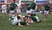 19 March 2023; Fintan Gunne of Ireland is tackled short of the try line by Joseph Woodward of England during the U20 Six Nations Rugby Championship match between Ireland and England at Musgrave Park in Cork. Photo by David Fitzgerald/Sportsfile