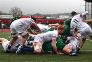 19 March 2023; Brian Gleeson of Ireland, hidden, scores his side's second try during the U20 Six Nations Rugby Championship match between Ireland and England at Musgrave Park in Cork. Photo by David Fitzgerald/Sportsfile