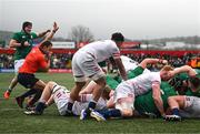 19 March 2023; Brian Gleeson of Ireland, hidden, scores his side's second try during the U20 Six Nations Rugby Championship match between Ireland and England at Musgrave Park in Cork. Photo by David Fitzgerald/Sportsfile