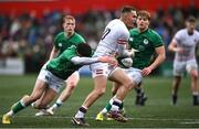 19 March 2023; Monty Bradbury of England is tackled by John Devine of Ireland during the U20 Six Nations Rugby Championship match between Ireland and England at Musgrave Park in Cork. Photo by David Fitzgerald/Sportsfile