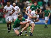 19 March 2023; Charlie Bracken of England is tackled by Hugh Gavin of Ireland during the U20 Six Nations Rugby Championship match between Ireland and England at Musgrave Park in Cork. Photo by David Fitzgerald/Sportsfile