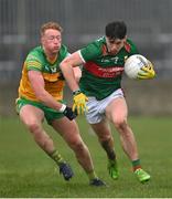 19 March 2023; Sam Callinan of Mayo in action against Oisin Gallen of Donegal during the Allianz Football League Division 1 match between Donegal and Mayo at MacCumhaill Park in Ballybofey, Donegal. Photo by Ramsey Cardy/Sportsfile