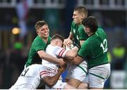 19 March 2023; Sam Prendergast of Ireland rips the ball from Joseph Woodward of England during the U20 Six Nations Rugby Championship match between Ireland and England at Musgrave Park in Cork. Photo by David Fitzgerald/Sportsfile