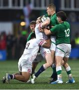 19 March 2023; Sam Prendergast of Ireland rips the ball from Joseph Woodward of England during the U20 Six Nations Rugby Championship match between Ireland and England at Musgrave Park in Cork. Photo by David Fitzgerald/Sportsfile