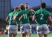 19 March 2023; Sam Prendergast of Ireland, centre, celebrates with Hugh Gavin, 11, after he scored their fifth try during the U20 Six Nations Rugby Championship match between Ireland and England at Musgrave Park in Cork. Photo by David Fitzgerald/Sportsfile