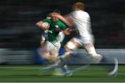 19 March 2023; John Devine of Ireland gets away from Lewis Chessum of England during the U20 Six Nations Rugby Championship match between Ireland and England at Musgrave Park in Cork. Photo by David Fitzgerald/Sportsfile