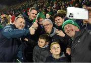 19 March 2023; Ireland head coach Richie Murphy, left, and assistant coach Mark Sexton take a picture with Gerry Sexton, father of Mark and Jonathan after the U20 Six Nations Rugby Championship match between Ireland and England at Musgrave Park in Cork. Photo by David Fitzgerald/Sportsfile