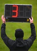 19 March 2023; The side line official holds a board indicating the amount of additional time to be played during the Allianz Hurling League Division 1 Group A match between Clare and Cork at Cusack Park in Ennis, Clare. Photo by Ray McManus/Sportsfile